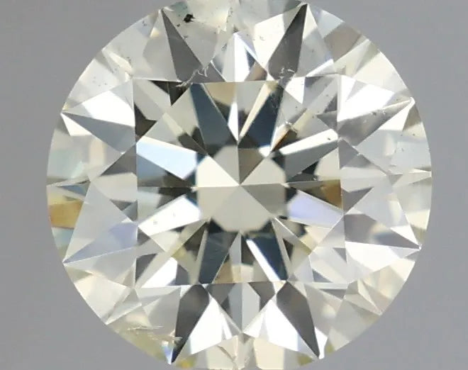 0.55ct Round Natural Diamond (Colour M, Clarity SI2, Cut EX, IGI Certified)