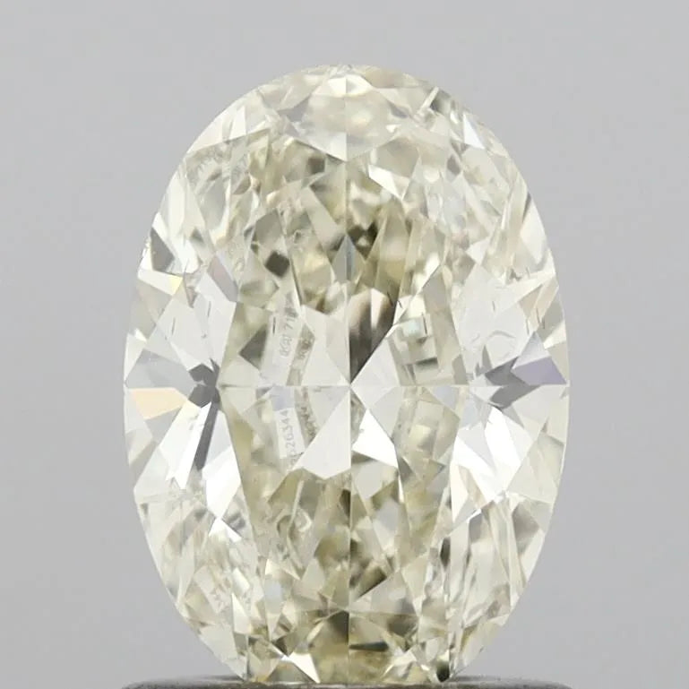 0.90ct Oval Natural Diamond (Colour L, Clarity SI1, Cut GD, IGI Certified)